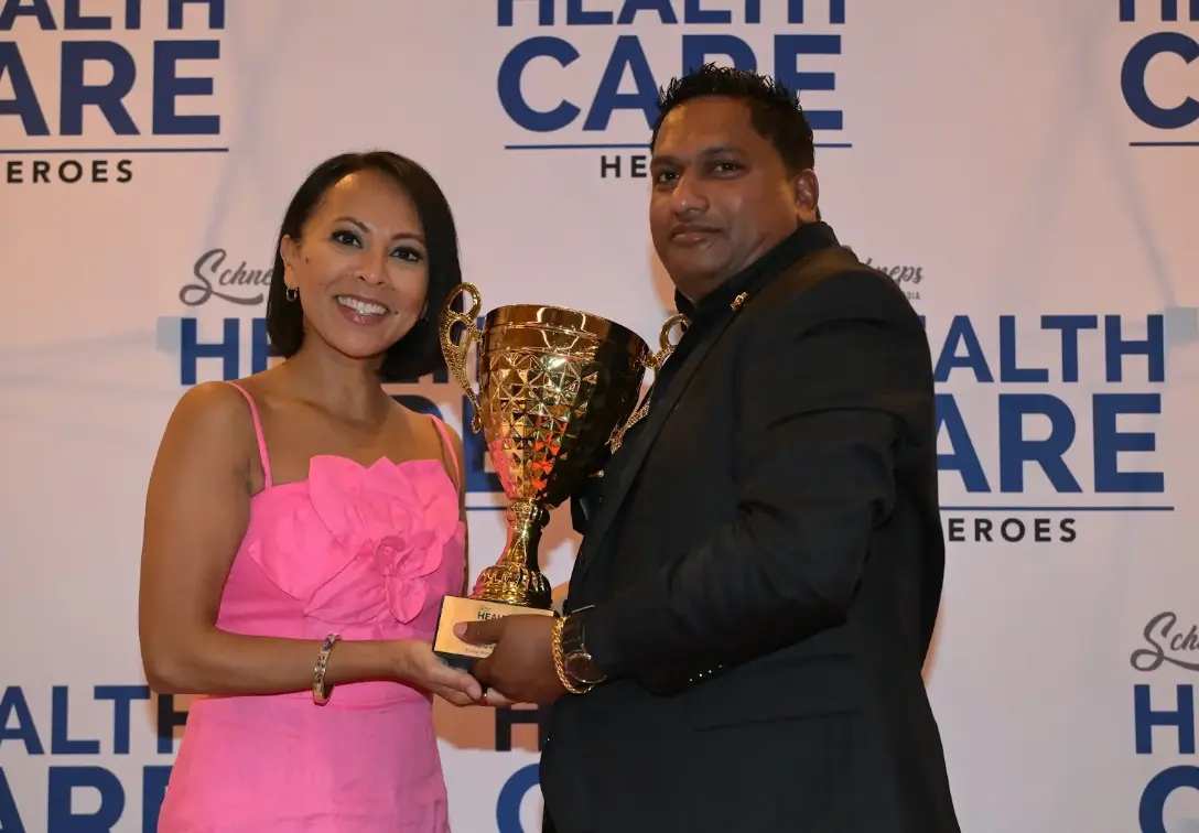 Navin Shivpal dancing at the formal Health Care Heroes awards reception
