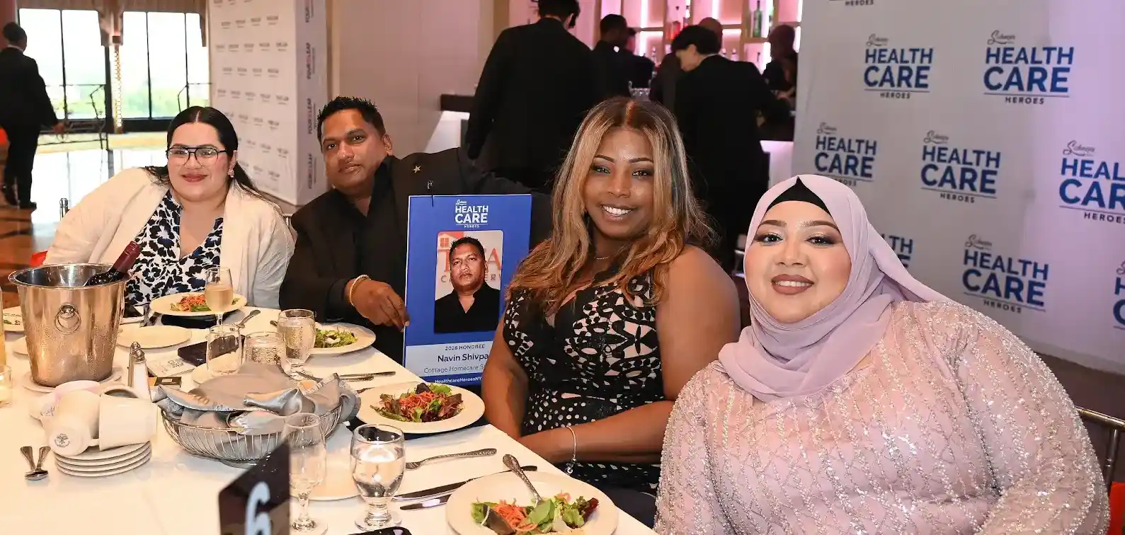 Cottage Home Care team seated at the Schneps Media Health Care Heroes awards dinner